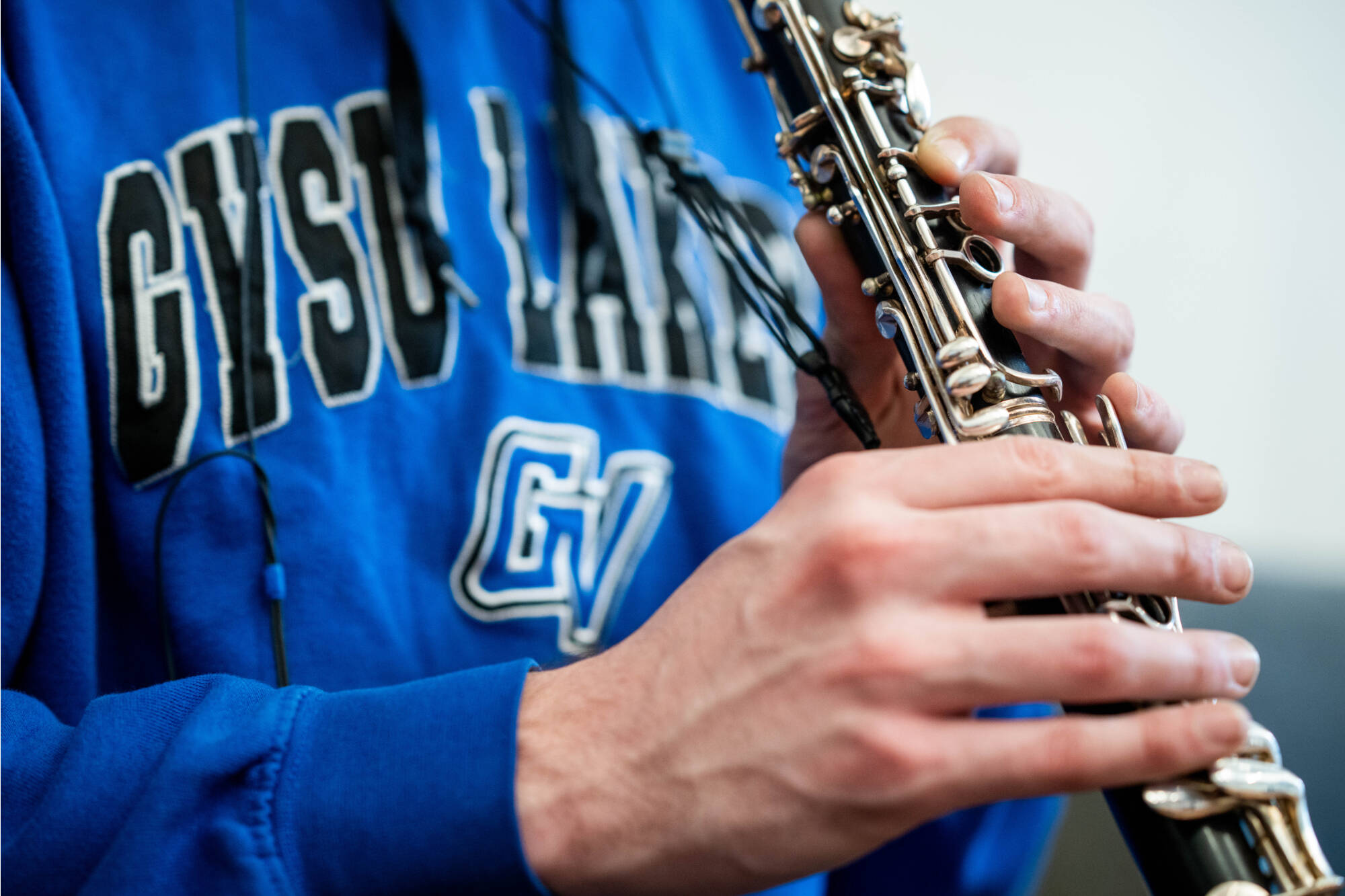 clarinet player wearing GVSU sweatshirt